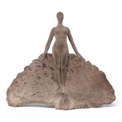 an image of a sculpture of a woman sitting on top of a rock