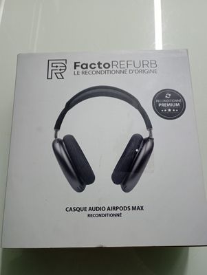 the box of a pair of headphones sitting on top of a table