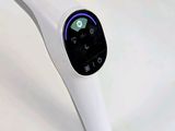 a white electronic device that is sitting on a table