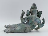 bronze statue of the hindu god sitting on his back on a white background
