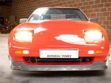an image of a red sports car in a garage