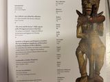 a book with a picture of a statue on it