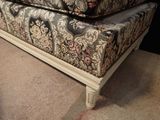 a couch that is sitting on top of a table