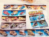 a lot of toy cars that are on the table