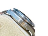 a watch that is sitting on top of a bag