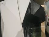 a pile of computer equipment sitting on top of a pile of boxes