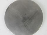 an image of a metal object on a white surface