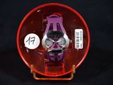 a purple watch in a red case on a black background