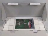 a box with a picture inside of it sitting on a table
