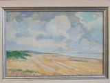 une photo d'un tableau représentant une scène de plage, dans un cadre