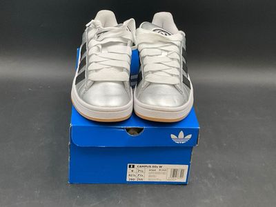 adidas superstar leather trainers in white and silver