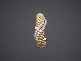 an 18k yellow gold and diamond ring