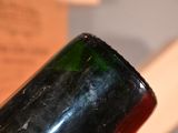 a wine bottle that is sitting on a table