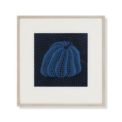 a framed picture of a blue pumpkin on a black background