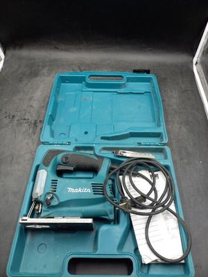a close up of a tool in a blue case on a table