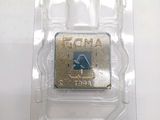 an image of a close up of a small processor in a plastic container