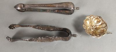 three spoons and a bowl sitting on a table