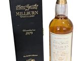 a bottle of whisky with a box on a white background