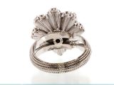 sterling silver ring with black stone center and sunburst design