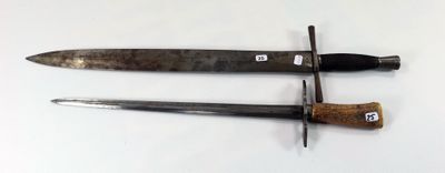 two knives that are on a white surface