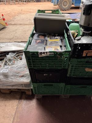 a stack of crates with a coffee maker on top of it