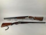 a pair of shotguns, one of which has been cleaned and the other has been cleaned