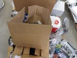 a cardboard box that is sitting on a pallet next to other items