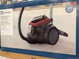 the black and red vacuum is on display in the store