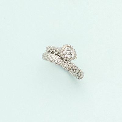an image of a diamond and white gold ring on a blue background