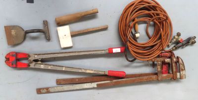 a lot of tools that are laying out on the table