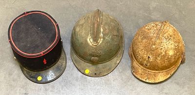 three helmets sitting next to each other on the floor