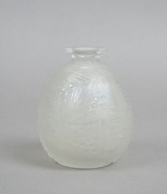 an image of a white glass vase on a table
