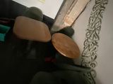 a teddy bear that is sitting in a chair