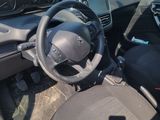 a car with a steering wheel and a dashboard with a steering wheel
