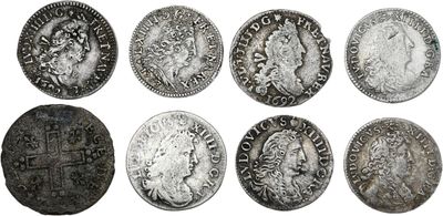 un ensemble de six pièces d'argent sur lesquelles figurent des portraits