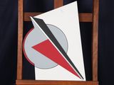 a picture of a wooden easel with a red and white triangle on it