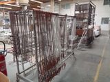 a metal rack with many wires on it in a warehouse