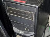 a computer that is sitting on top of a desk
