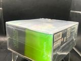 a clear box with a green lid sitting on a metal stand