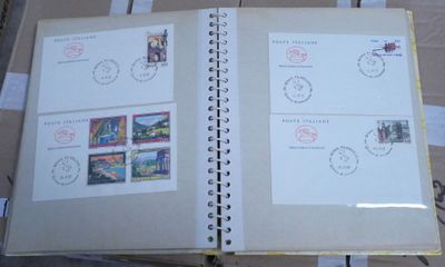 a lot of stamps on the pages of a book