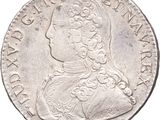 gros plan d'une pièce de monnaie sur fond blanc