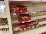 a lot of food on the shelves in the store