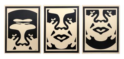 three framed black and white portraits of a man and a woman