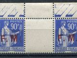 a stamp with a picture of a man and a woman on it