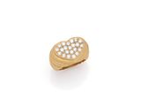 an 18k gold and diamond heart ring