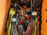 a bag full of tools and other items inside of it