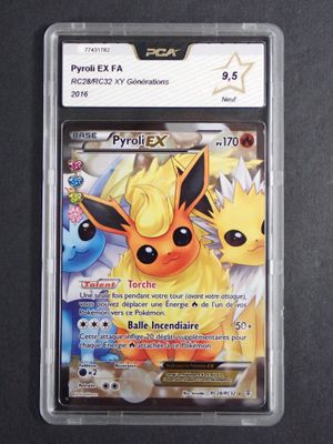 a close up of a pokemon card in a plastic case