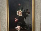 painting of flowers in a vase on a table next to a wall