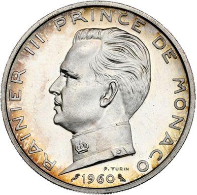 une image montrant un gros plan d'une pièce de monnaie sur laquelle figure le visage d'un homme