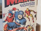 an old comic book is sitting on a counter in front of a window